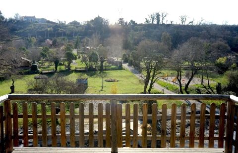 Terrace overlooking the river and football field